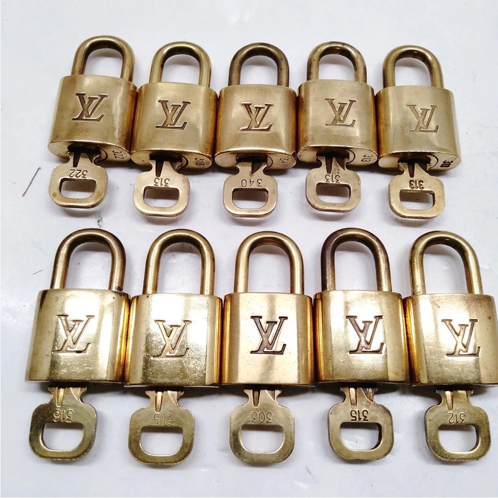 Pre loved authentic Louis Vuitton Brass Padlocks with Keys $50/each